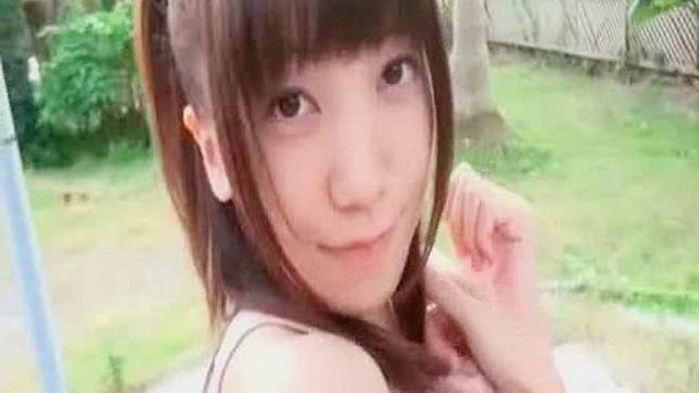 Young Japanese shows off her naughty side in sexy outdoor