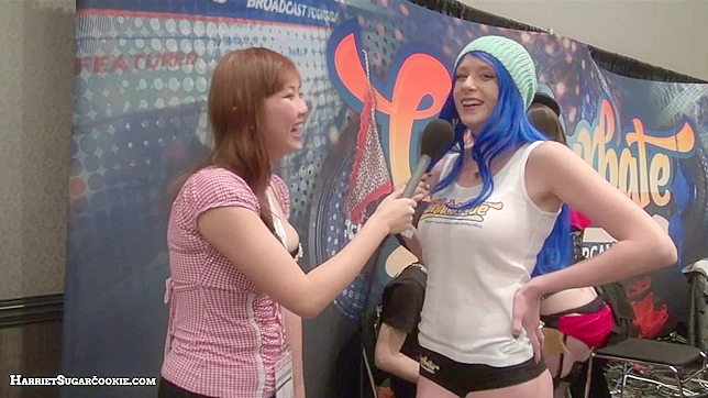 Naughty doll with blue hair is giving interview to her horny doll