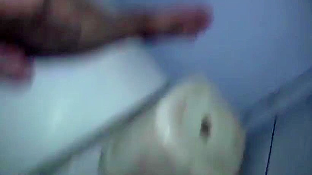 The action is happening in a small bathroom and it features a Japanese chick